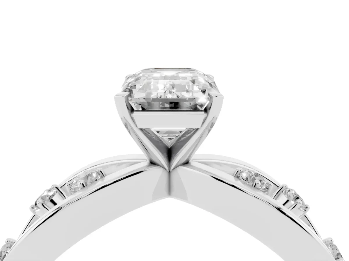 Emerald Cut Cut Solitaire Diamond with Side Stones on Criss-Cross Band and Four-Prong Setting Platinum