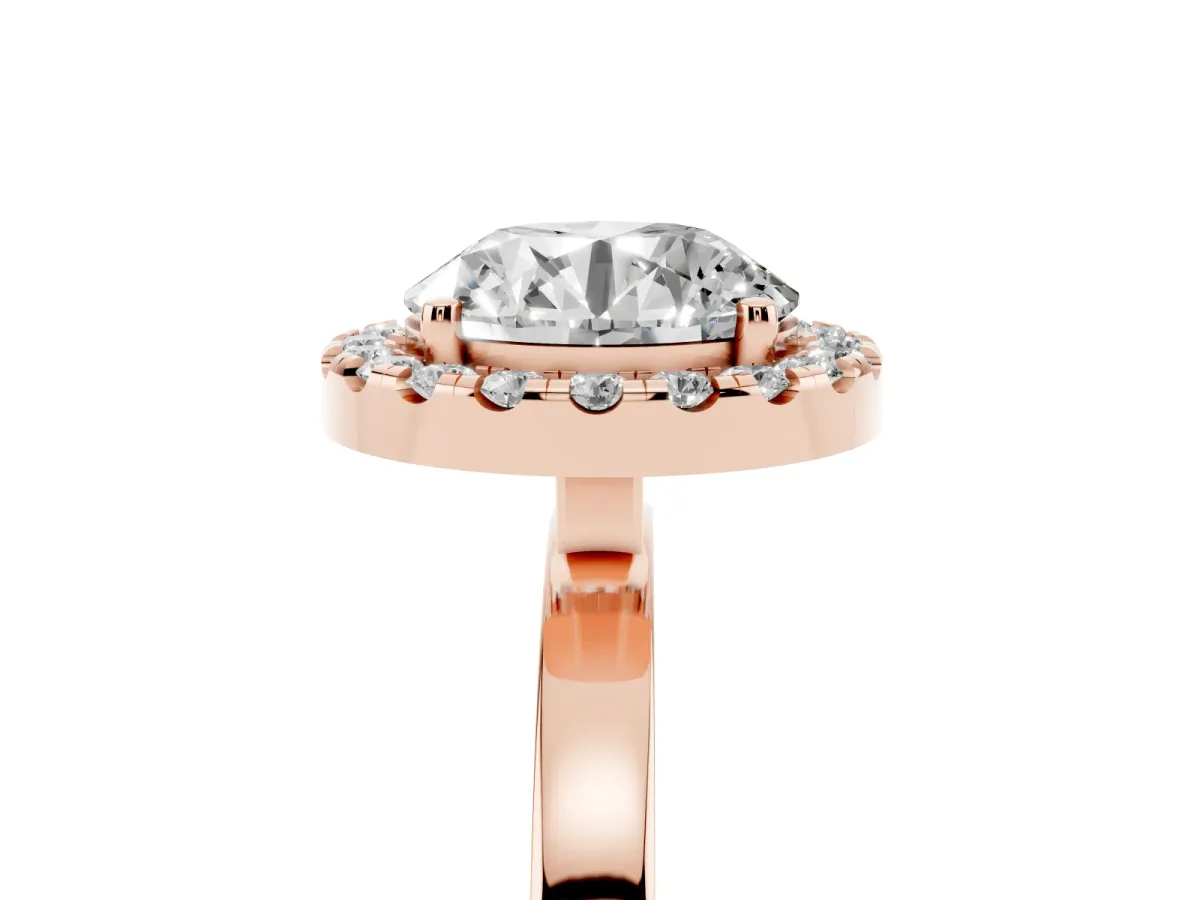 Round Cut Halo Diamond Solitaire with Pavé Band and Four-Prong Setting Rose gold