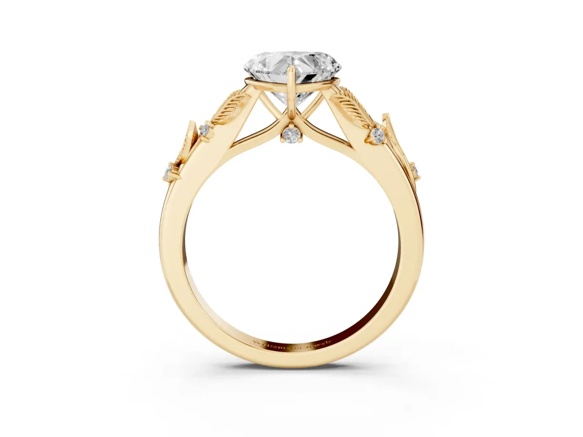 Heart Cut Diamond Solitaire Ring with Leaf Motif Band and Four-Prong Setting Yellow gold