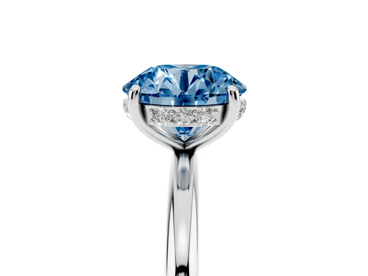Fancy Blue Round Cut Solitaire Diamond Ring with a Classic Band and Four-Prong Setting Silver