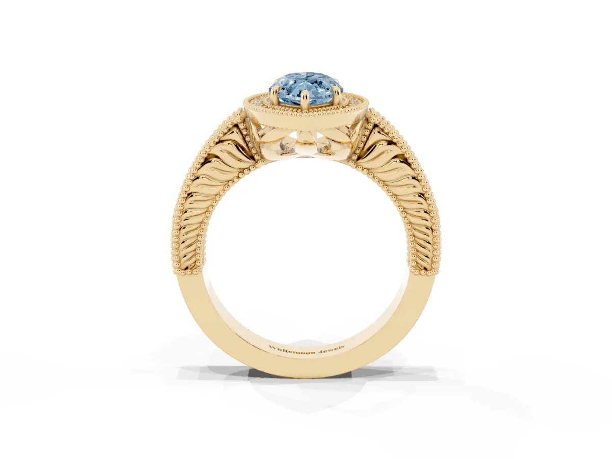 Fancy Blue Marquise Cut Cut Halo Diamond Ring with Pavé Band and Four-Prong Setting Yellow gold