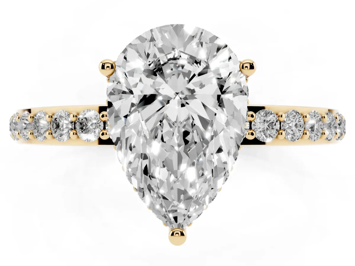 Pear Cut Diamond Solitaire Ring with Pavé Band and Hidden Halo Yellow gold