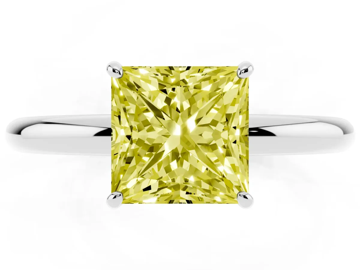 Fancy Yellow Princess Cut Solitaire Diamond Ring with Four-Prong Setting on a Plain Band Silver