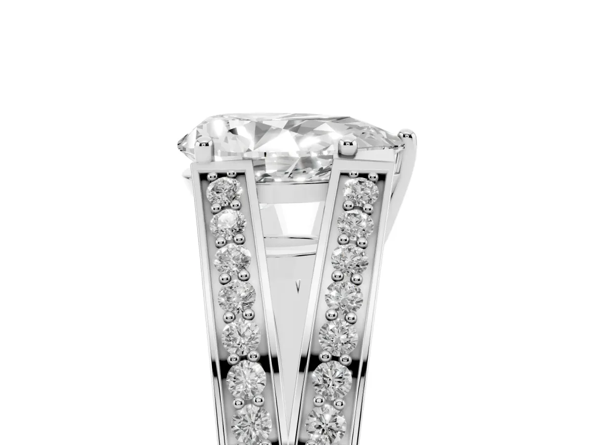 Pear Cut Diamond Split Shank Ring with Pavé Band and Four-Prong Setting White gold