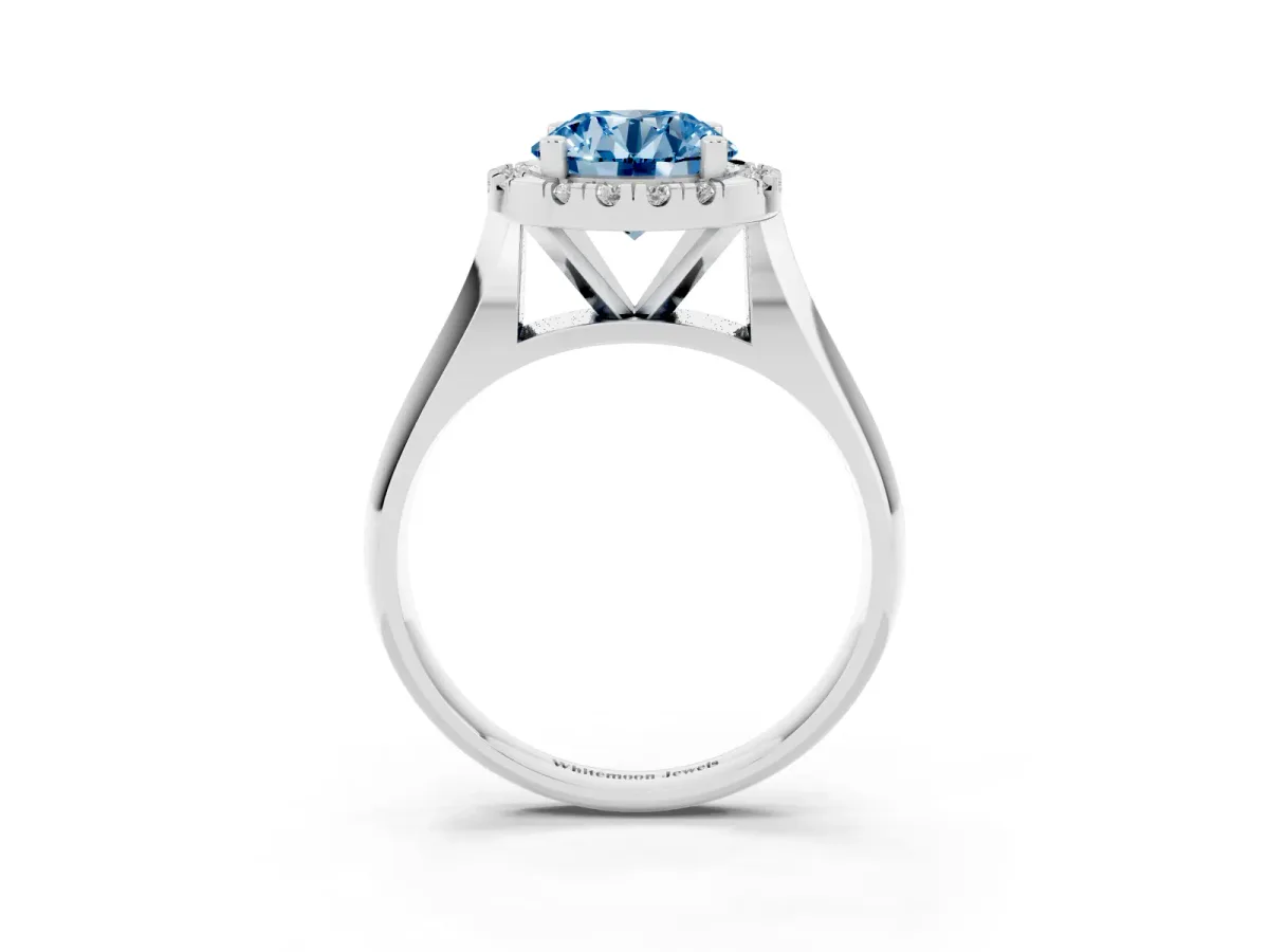 Fancy Blue Round Cut Cut Halo Solitaire Engagement Ring with Square Band and Four-Prong Setting Silver