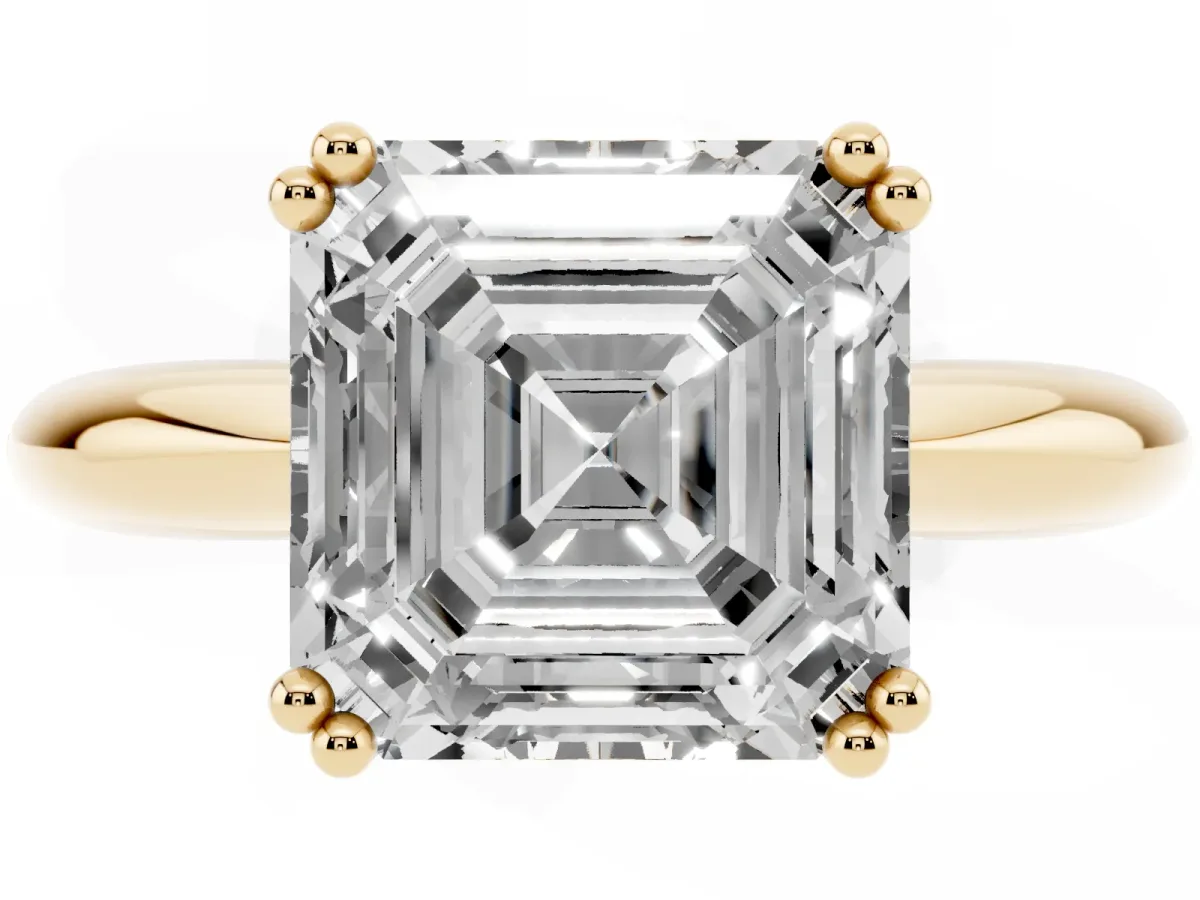 Asscher Cut Cut Solitaire Engagement Ring with Tapered Band and Four-Prong Setting Yellow gold