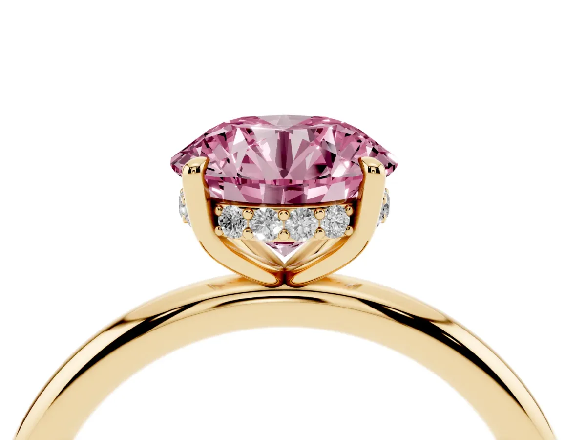 Fancy Pink Round Cut Diamond Solitaire Ring with Thin Band and Four-Prong Setting Yellow gold