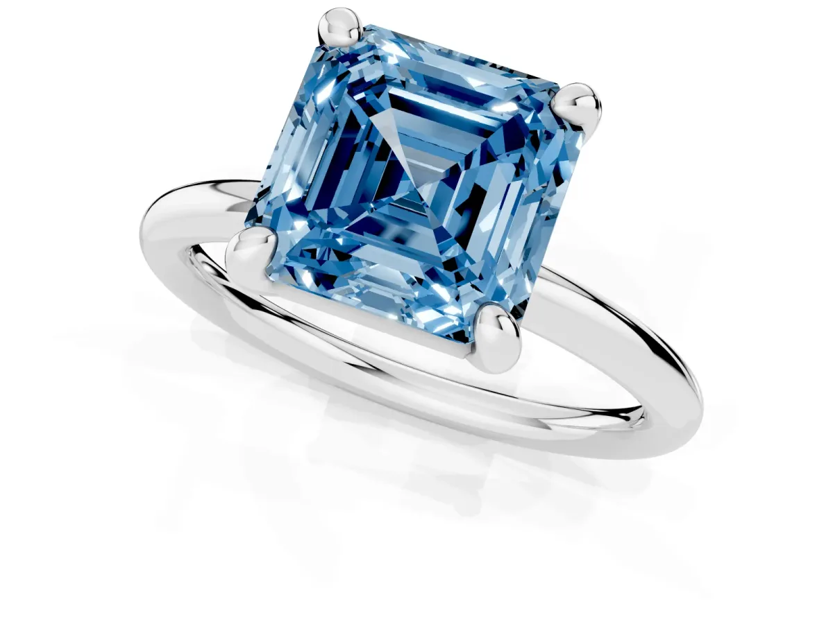 Fancy Blue Asscher Cut Solitaire Diamond Ring with Four-Prong Setting on a Plain Band Platinum