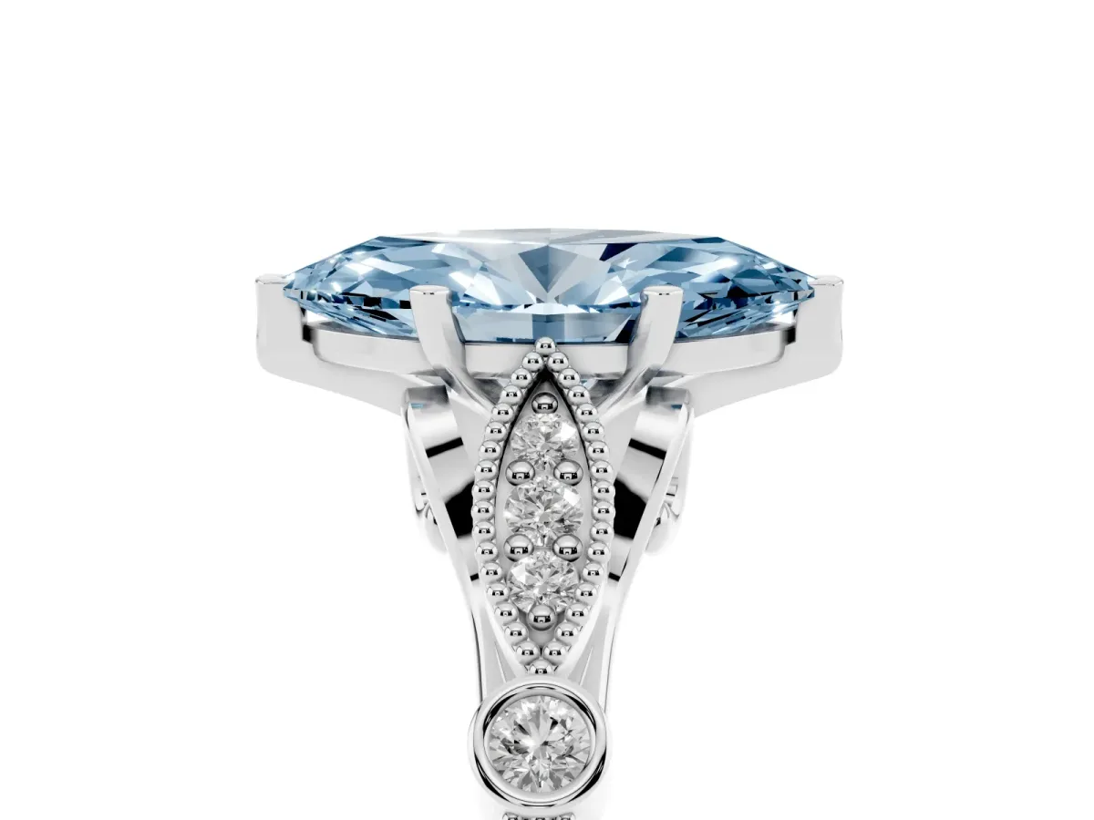 Fancy Blue Marquise Cut Cut Diamond with Milgrain Marquise and Bezel Accents on a Solitaire Band with Prong Setting Silver