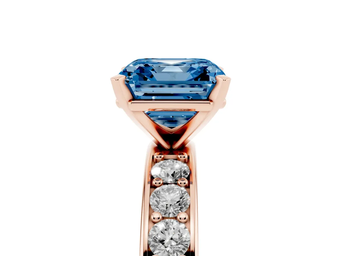 Fancy Blue Asscher Cut Diamond Engagement Ring with Channel Set Round Band and Prong Setting Rose gold