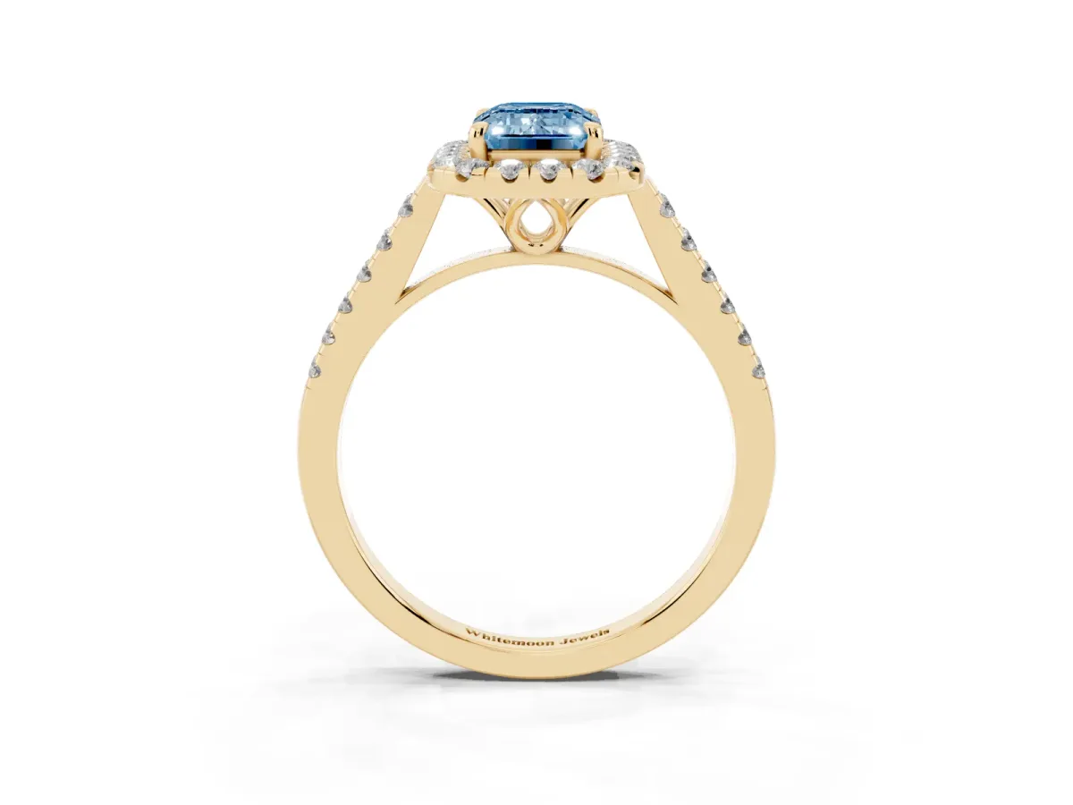 Fancy Blue Emerald Cut Halo Pavé Diamond Engagement Ring with Four-Prong Setting Yellow gold