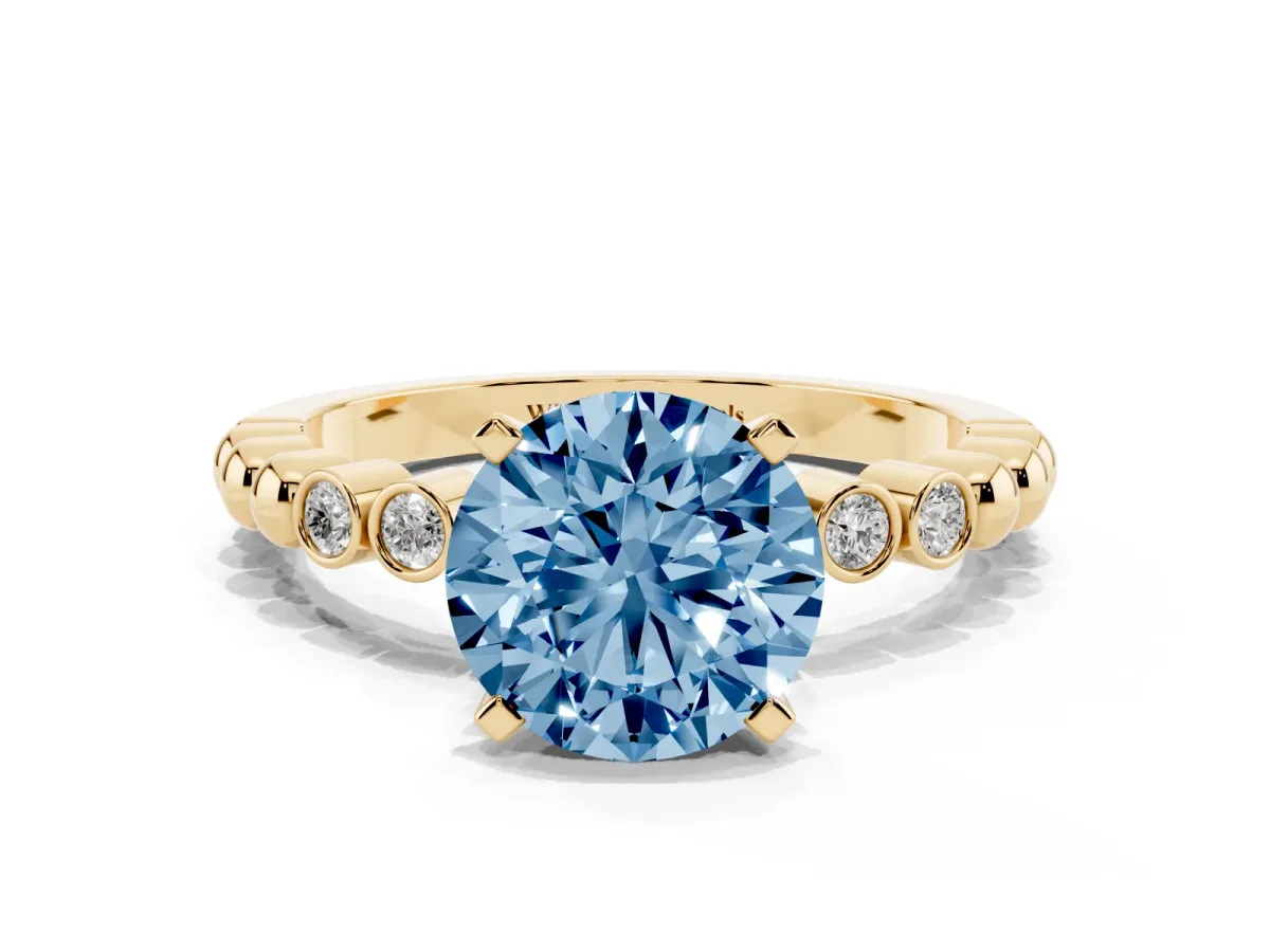 Fancy Blue Round Cut Solitaire Bezel Accent Diamond Engagement Ring with Beaded Band and Four-Prong Setting Yellow gold
