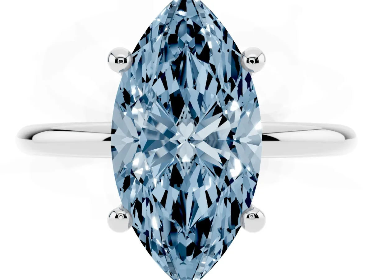 Fancy Blue Marquise Cut Solitaire Diamond Ring with 4-Prong Setting on a Classic Band Silver
