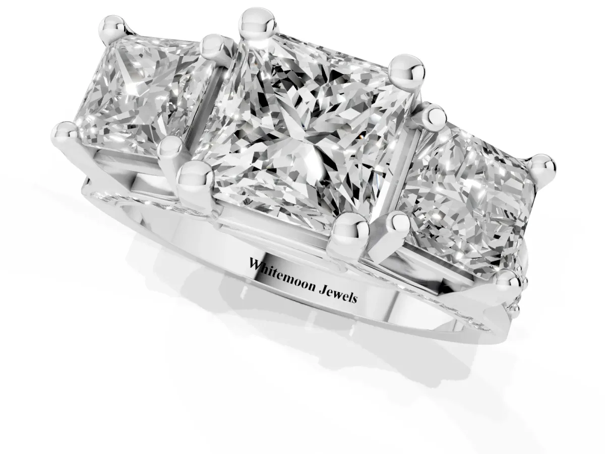 Princess Cut Diamond Three-Stone Ring with Channel Set Band and Four-Prong Setting Silver