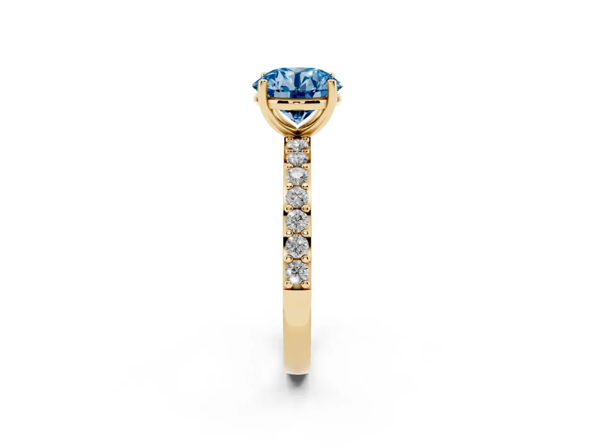 Fancy Blue Round Cut Cut Diamond Solitaire with Pave Band and Four-Prong Setting Yellow gold