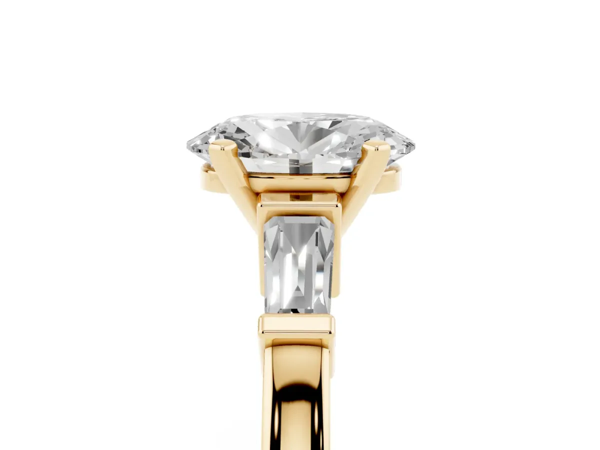 Oval Cut Cut Diamond Solitaire Ring with Tapered Baguette Accents and Four-Prong Setting Yellow gold