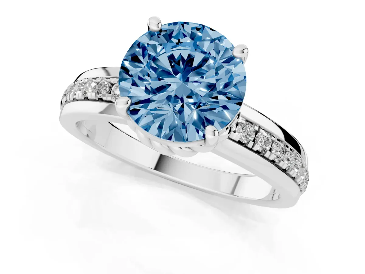 Fancy Blue Round Cut Solitaire Diamond Ring with Channel Set Band and Six-Prong Setting Silver