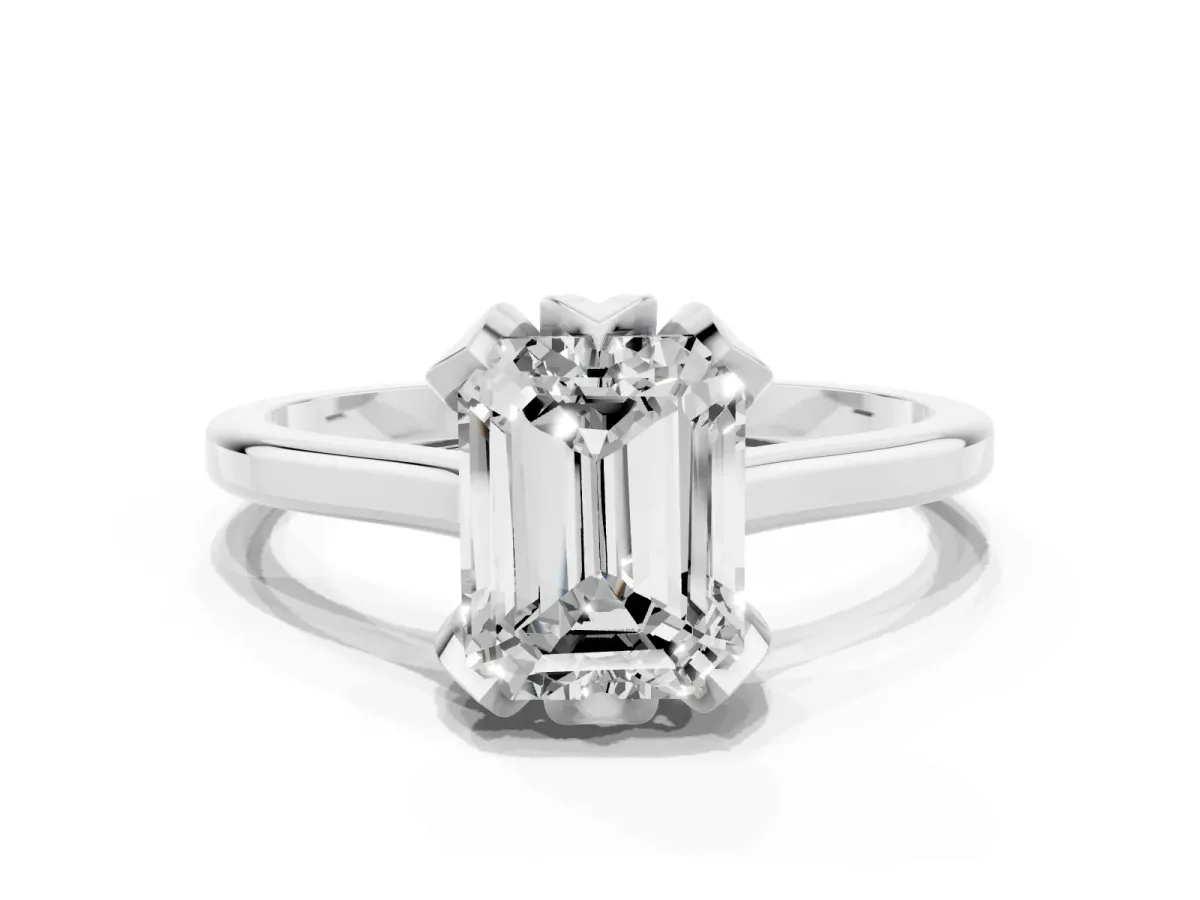 Emerald Cut Diamond Solitaire Ring with Flower Prong Setting and Classic Band Platinum