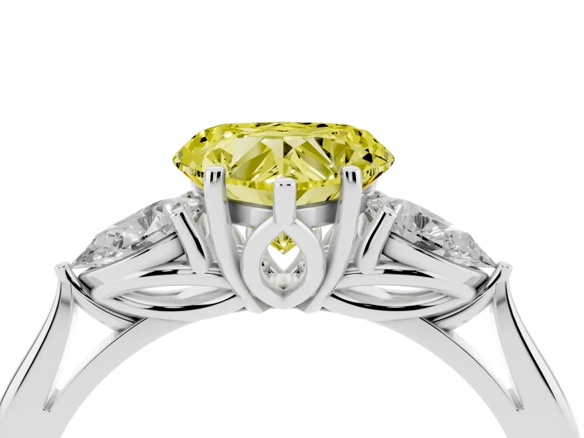 Fancy Yellow Three-Stone Heart Cut Diamond Ring with Pear Side Stones in Four-Prong Setting Silver