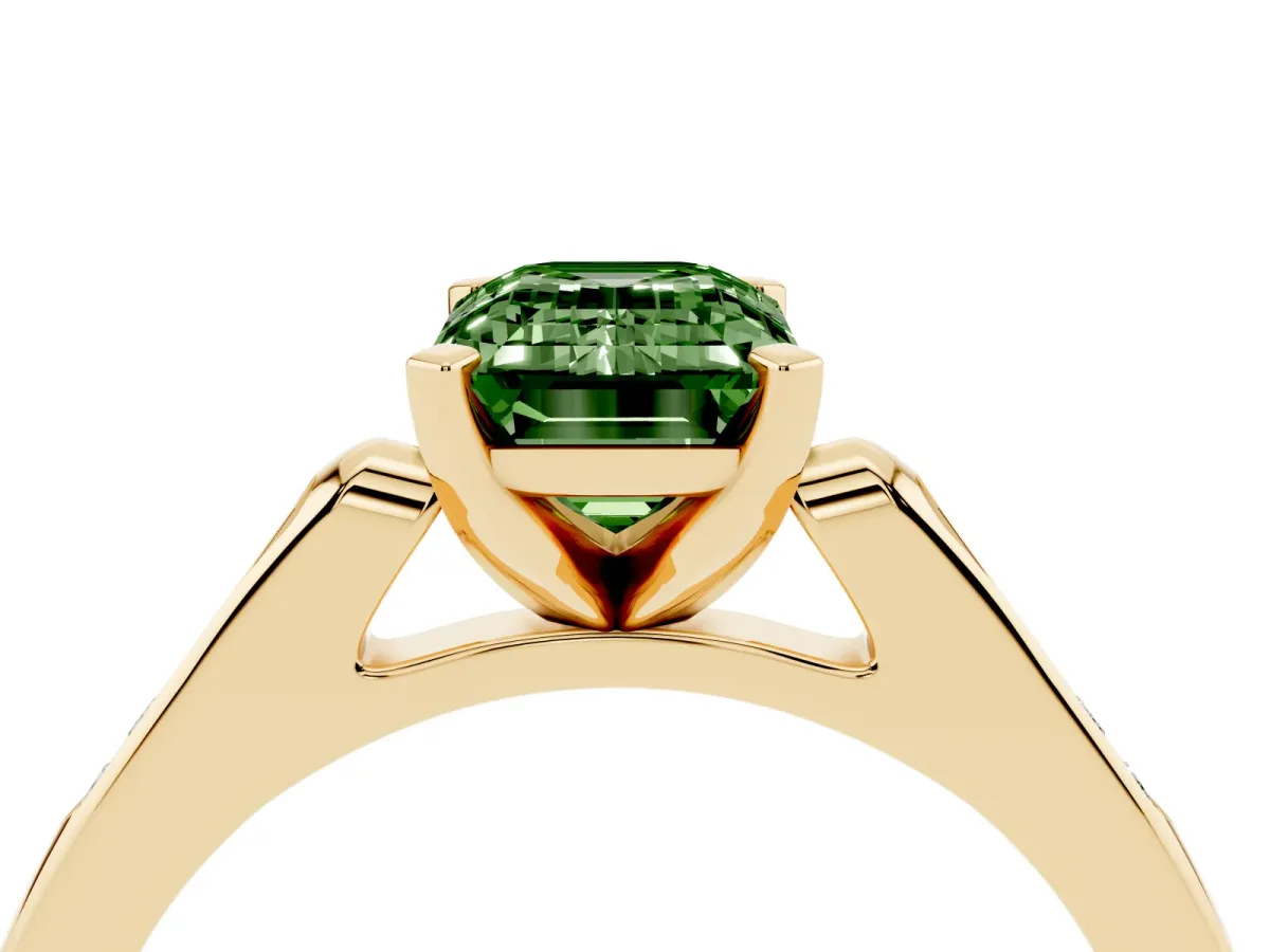 Fancy Green Emerald Cut Diamond Solitaire Ring with Channel Set Round Band and Prong Setting Yellow gold