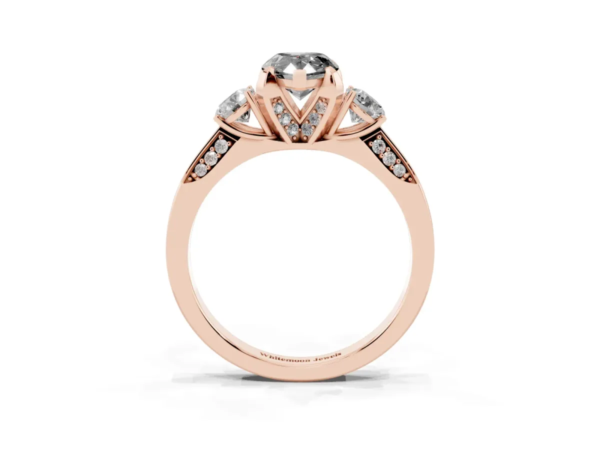 Fancy Black Pear Cut Brilliant Three-Stone Diamond Ring with Pavé Band and Four-Prong Setting Rose gold