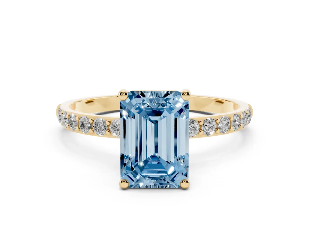 Fancy Blue Emerald Cut Diamond Solitaire Ring with Round Pavé Shoulders and Prong Setting Yellow gold