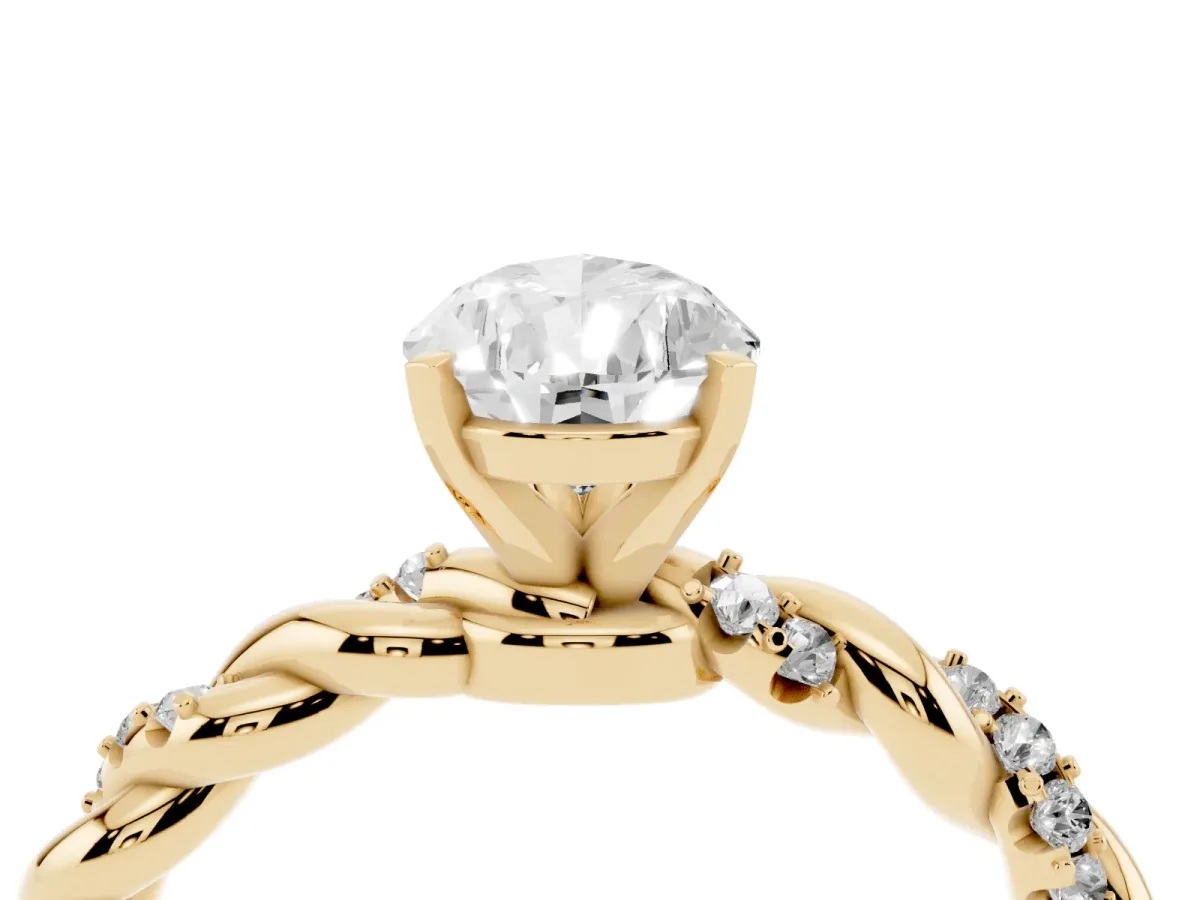 Pear Cut Diamond Solitaire Ring with Twisted Band and Pavé Accents Yellow gold