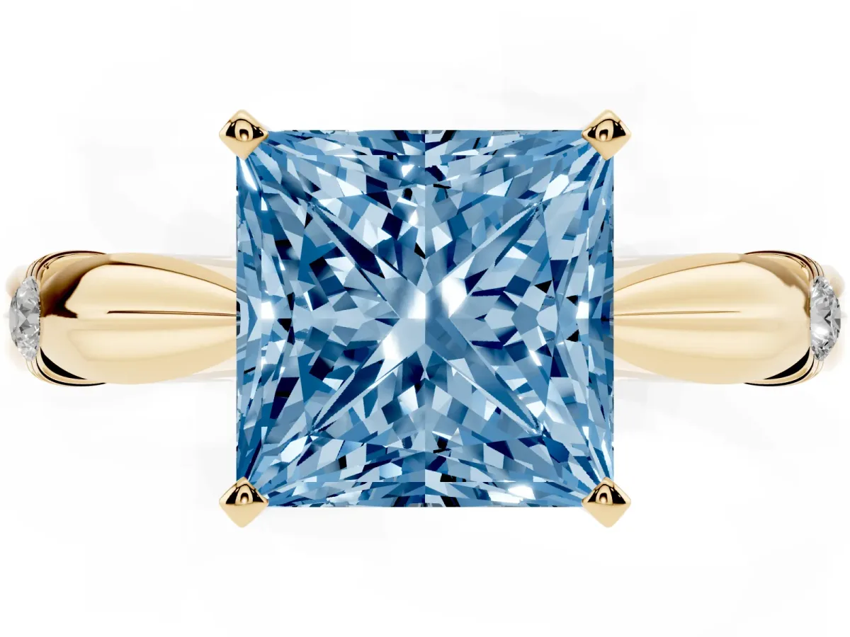 Fancy Blue Princess Cut Solitaire Diamond Twisted Band with Four-Prong Setting Yellow gold