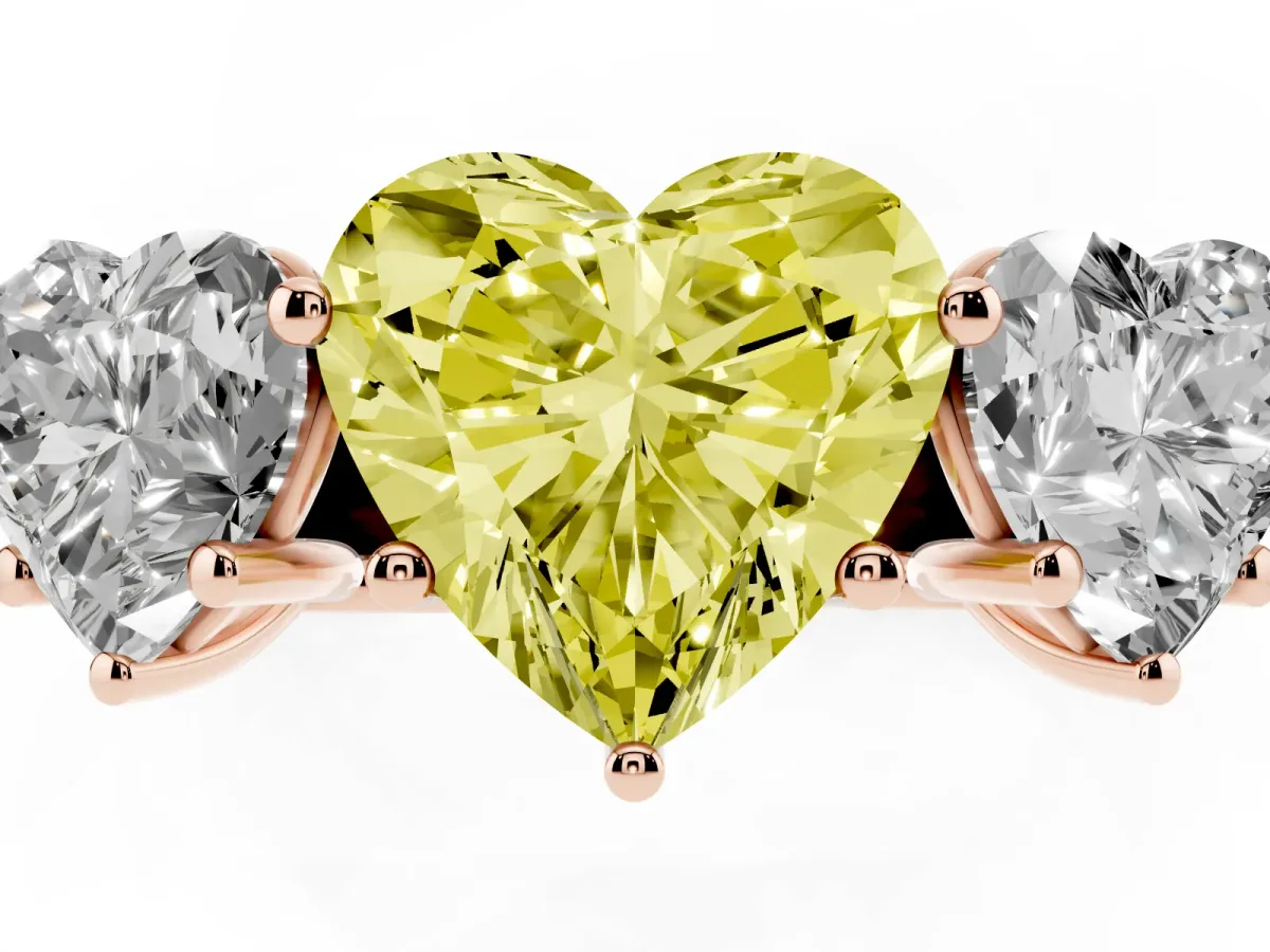 Fancy Yellow Heart Cut Three-Stone Diamond Ring with Prong Setting on a Classic Band Rose gold