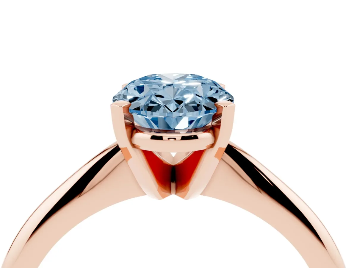 Fancy Blue Oval Cut Cut Solitaire Ring with Four-Prong Setting on a Classic Band Rose gold
