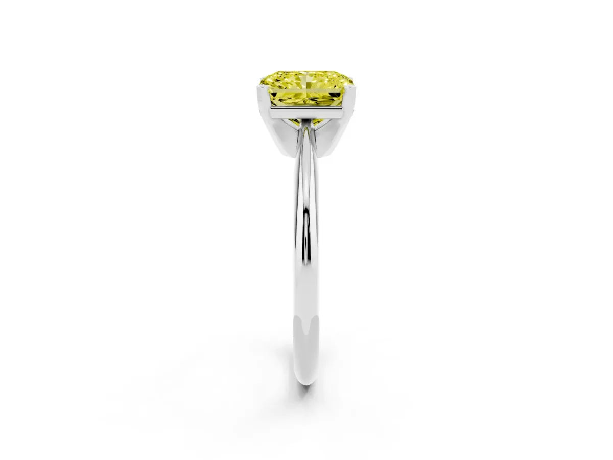 Fancy Yellow Radiant Cut Cut Solitaire Ring with Four-Prong Setting on a Classic Band Silver