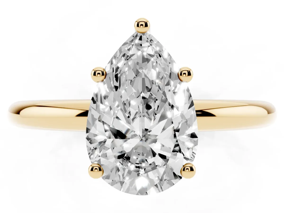 Pear Cut Cut Solitaire Engagement Ring with Four-Prong Setting and Classic Band Yellow gold