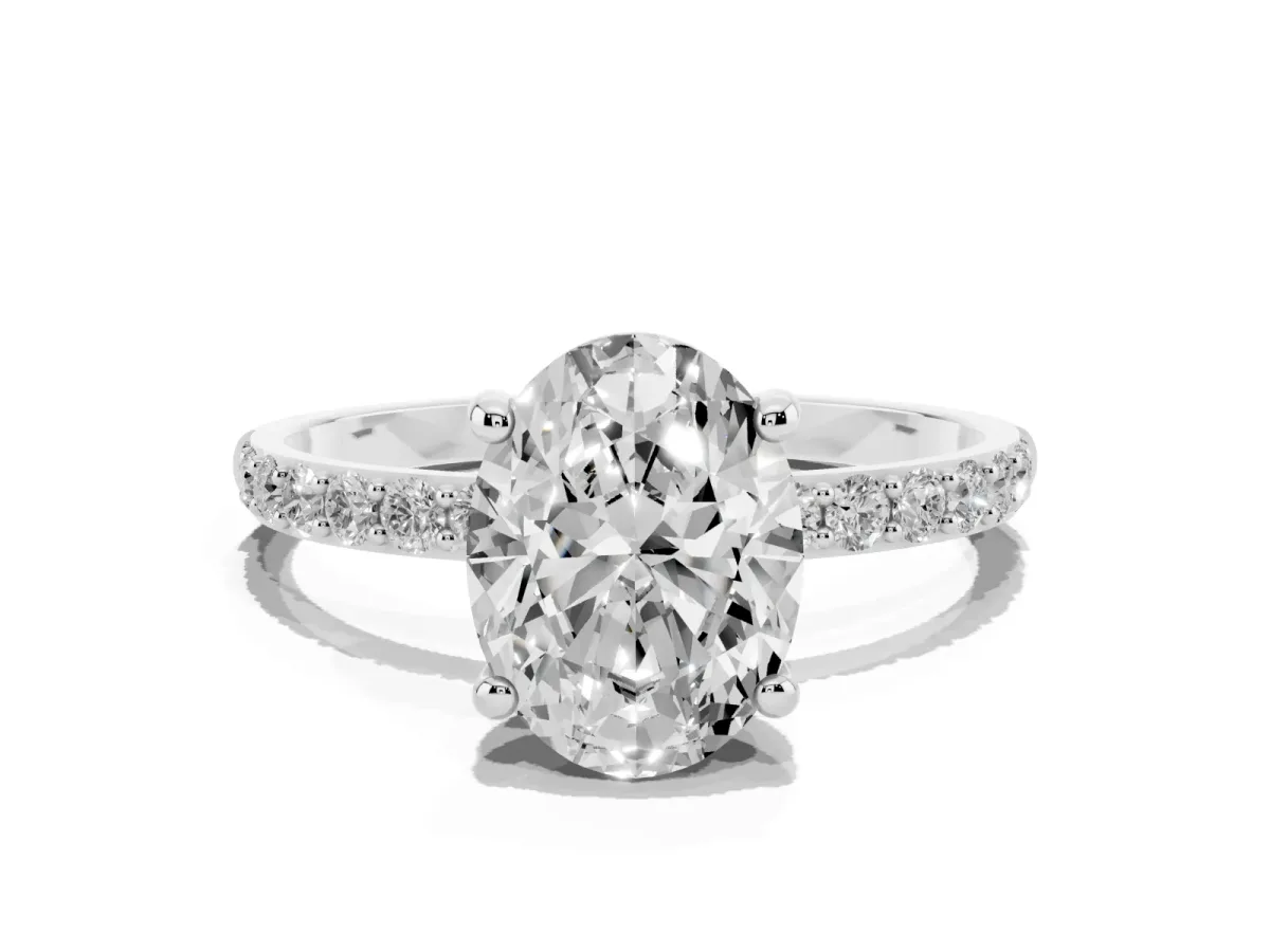 Oval Cut Diamond Solitaire Ring with Round Pavé Band and Prong Setting Silver