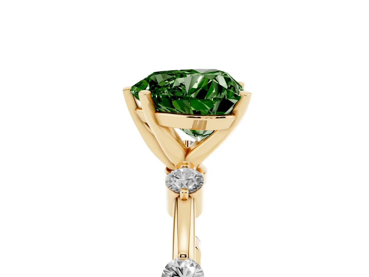 Fancy Green Heart Cut Solitaire Diamond Ring with Bezel Set Side Stones and Prong Setting Yellow gold