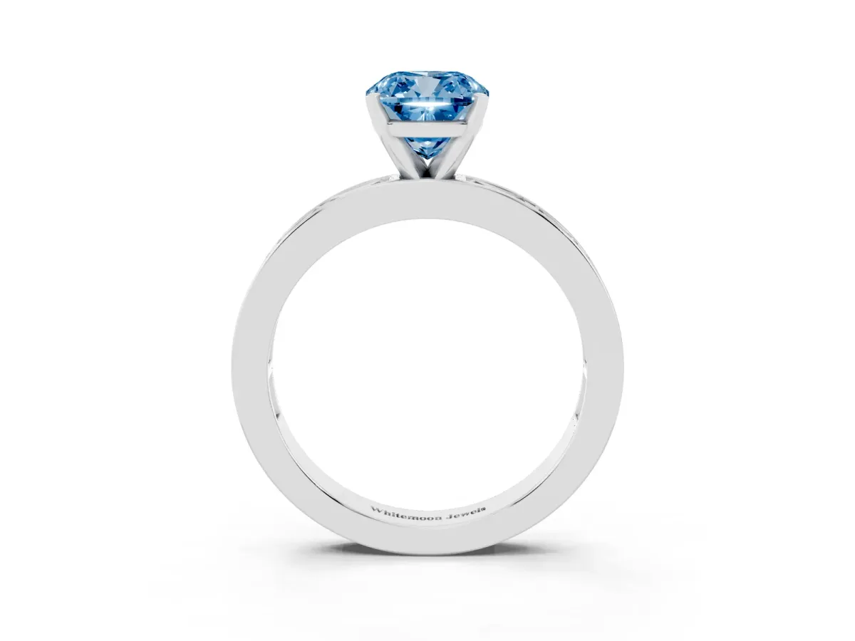 Fancy Blue Cushion Cut Solitaire Diamond Ring with Channel-Set Baguette Band and Four-Prong Setting Platinum