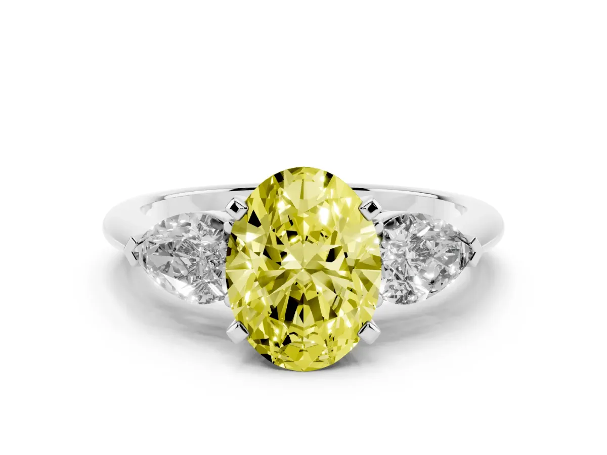 Fancy Yellow Three-Stone Oval Cut Diamond Ring with Pear Side Stones and Four-Prong Setting Platinum