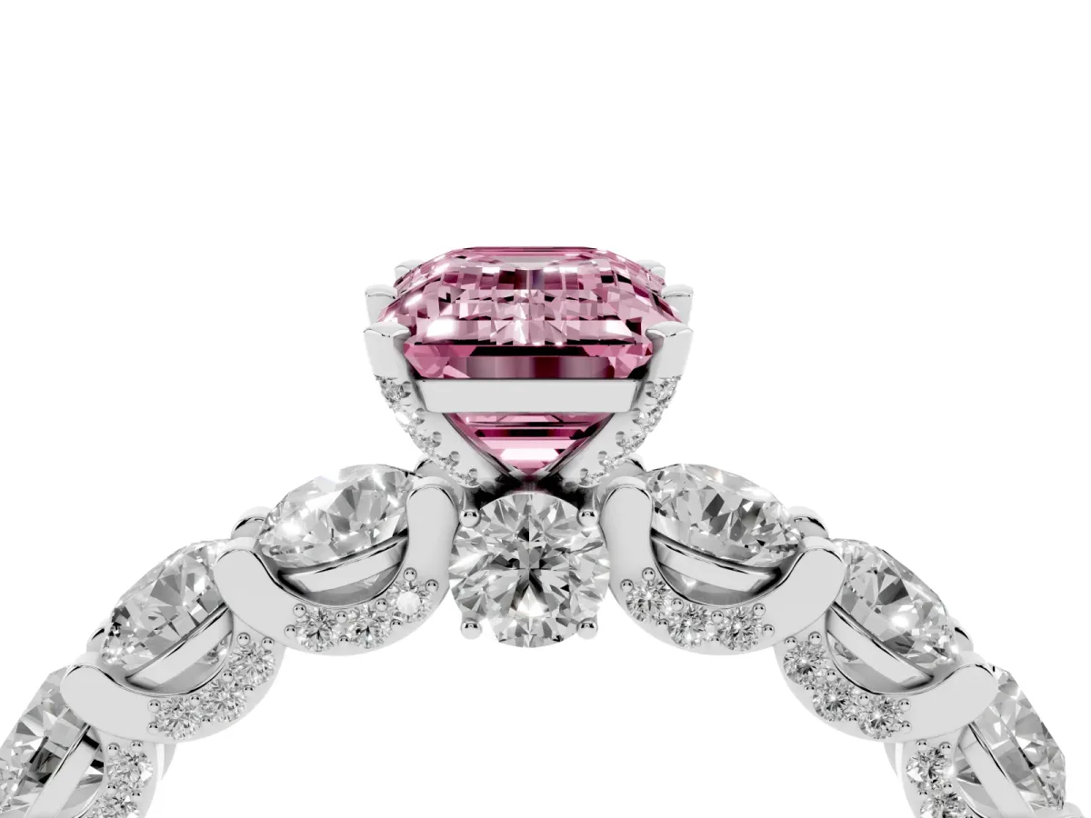 Fancy Pink Emerald Cut Diamond Side Stone Engagement Ring with Four-Prong Setting Platinum