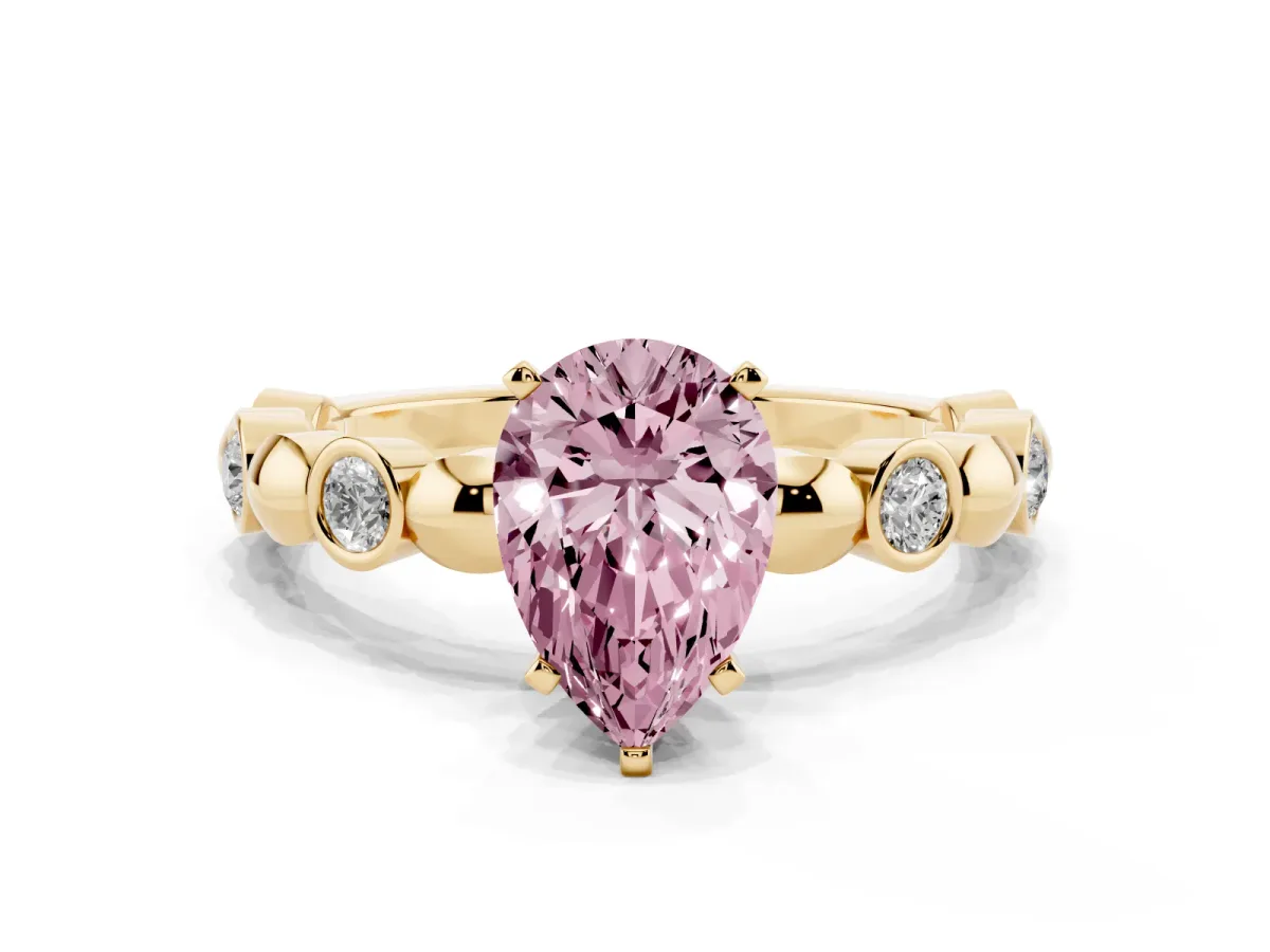 Fancy Pink Pear Cut Solitaire Bezel-Set Diamond Ring with Beaded Band and Four-Prong Setting Yellow gold