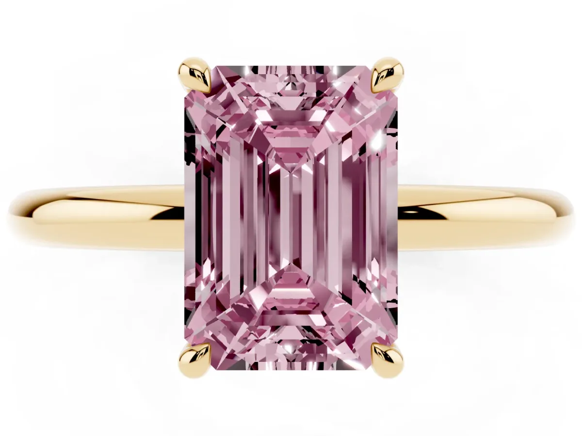 Fancy Pink Emerald Cut Diamond Solitaire Ring with Thin Band and Four-Prong Setting Yellow gold