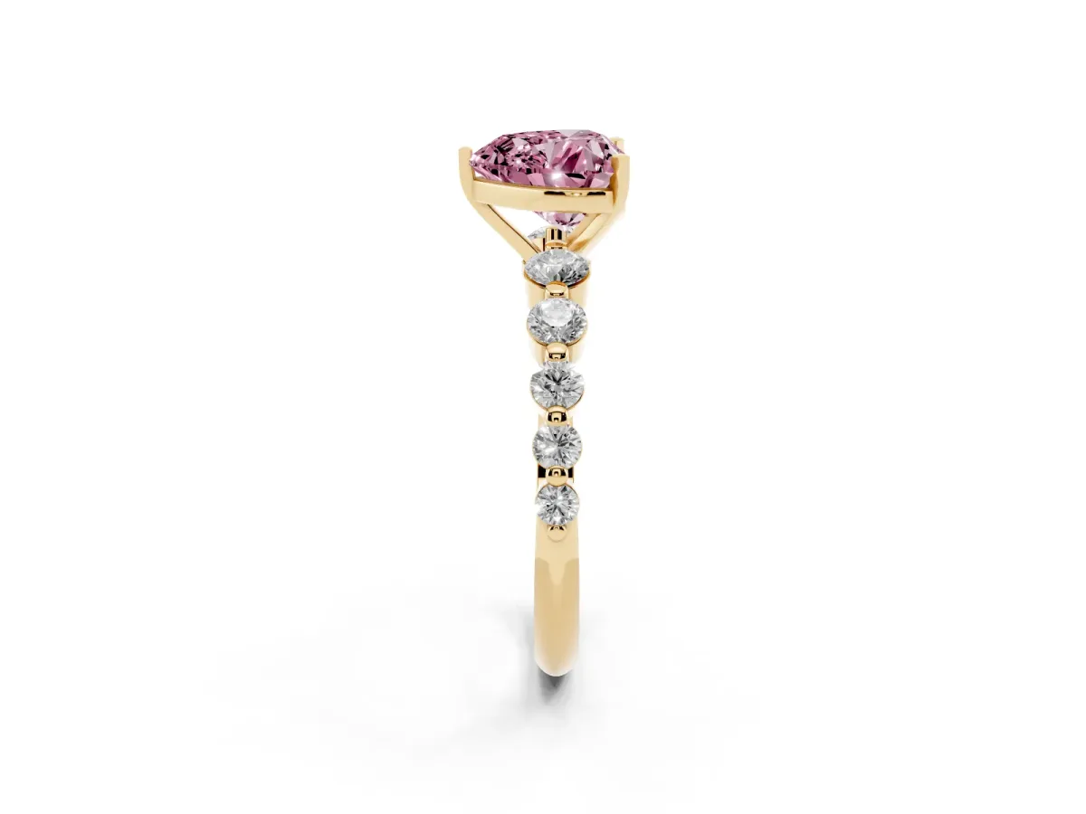 Fancy Pink Heart Cut Solitaire Diamond Ring with Pave Band and Four-Prong Setting Yellow gold