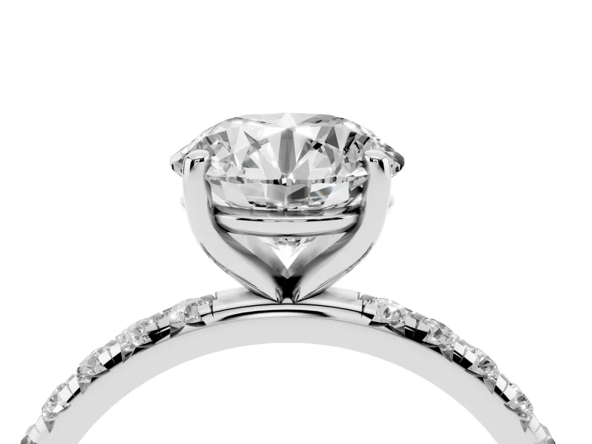 Round Cut Cut Diamond Solitaire Ring with Micro Pave Band and Four Prong Setting Silver