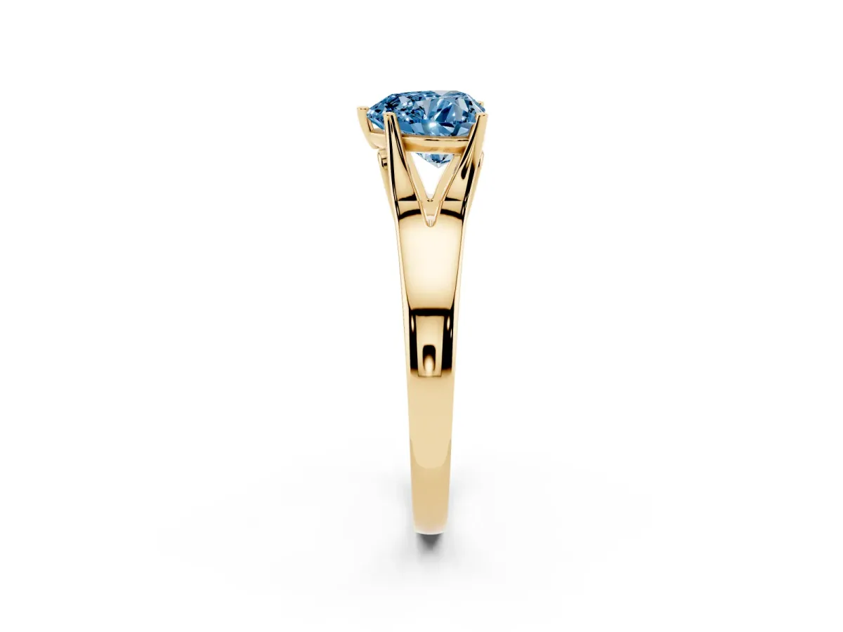 Fancy Blue Heart Cut Solitaire Diamond Ring with Cathedral Band and Four-Prong Setting Yellow gold