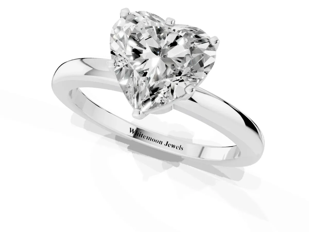 Heart Cut Solitaire Diamond Ring with Six-Prong Setting on a Classic Band Platinum