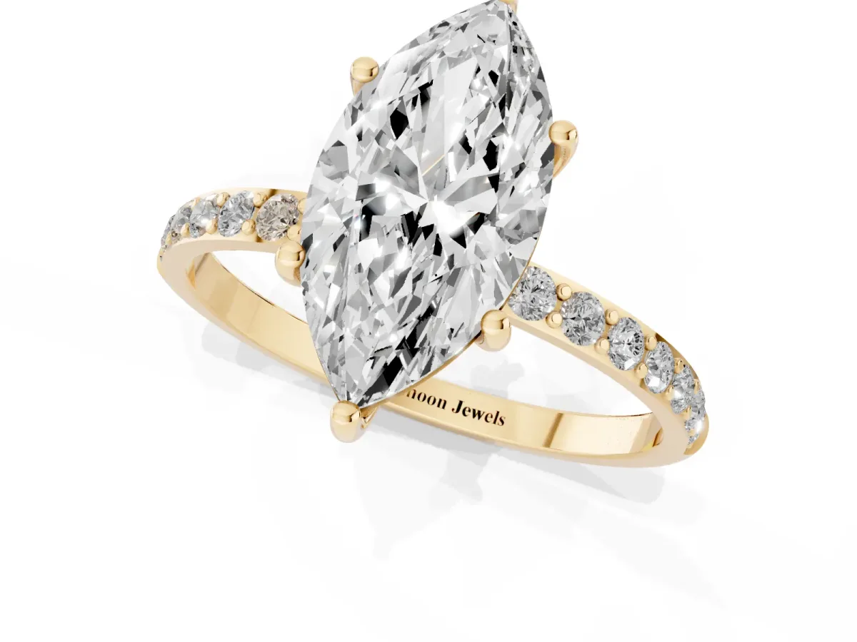 Marquise Cut Diamond Solitaire Ring with Round Pavé Shoulders and Prong Setting Yellow gold