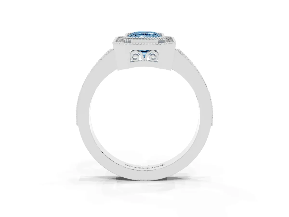 Fancy Blue Emerald Cut Cut Halo Diamond Ring with Pavé Band and Milgrain Prong Setting Platinum
