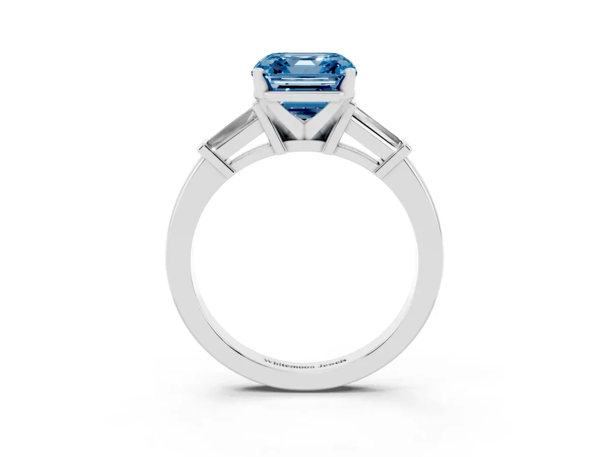 Fancy Blue Asscher Cut Cut Diamond Solitaire Ring with Tapered Baguette Accents and Four-Prong Setting White gold