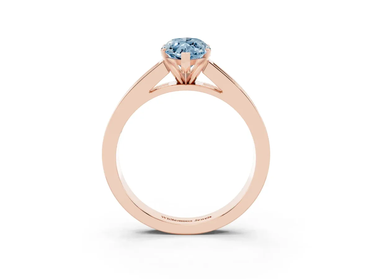 Fancy Blue Marquise Cut Solitaire Diamond Ring with Channel-Set Band and Four-Prong Setting Rose gold