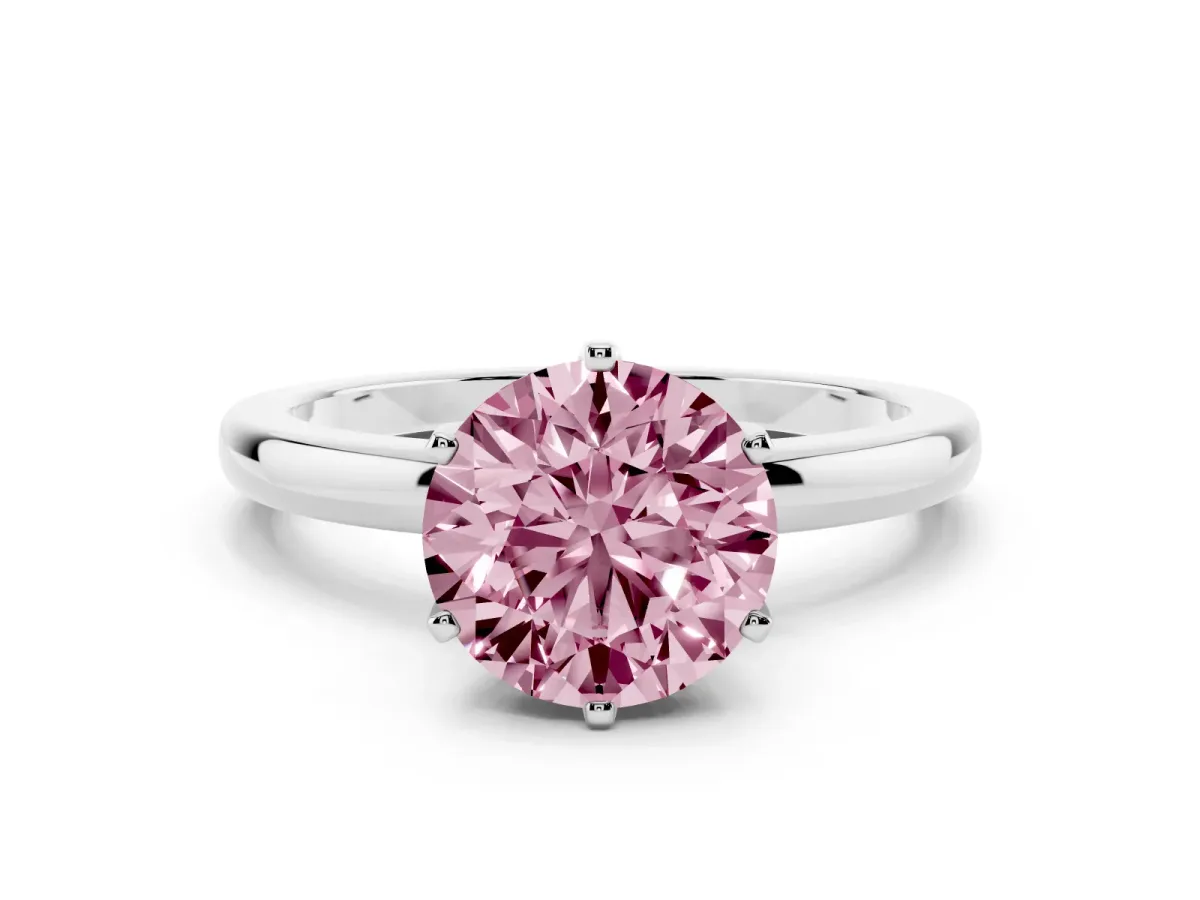Fancy Pink Round Cut Solitaire Diamond Ring with Six-Prong Setting on a Classic Band Platinum