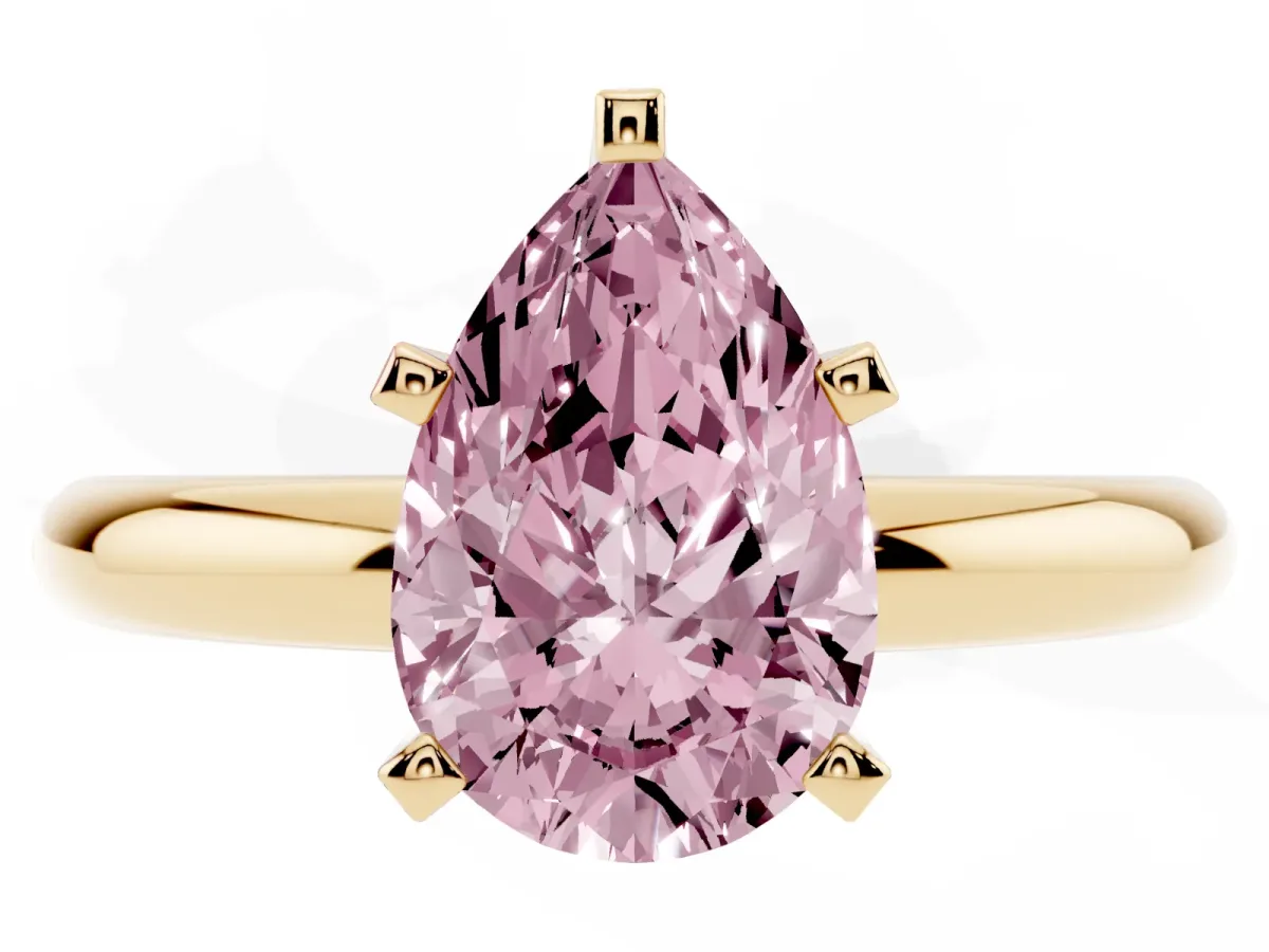 Fancy Pink Pear Cut Diamond Solitaire Engagement Ring with Round Band and Four-Prong Setting Yellow gold