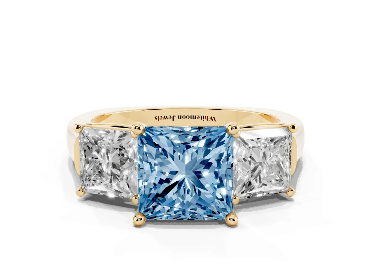 Fancy Blue Three-Stone Princess Cut Brilliant Diamond Trellis Ring with Comfort Fit Band Yellow gold
